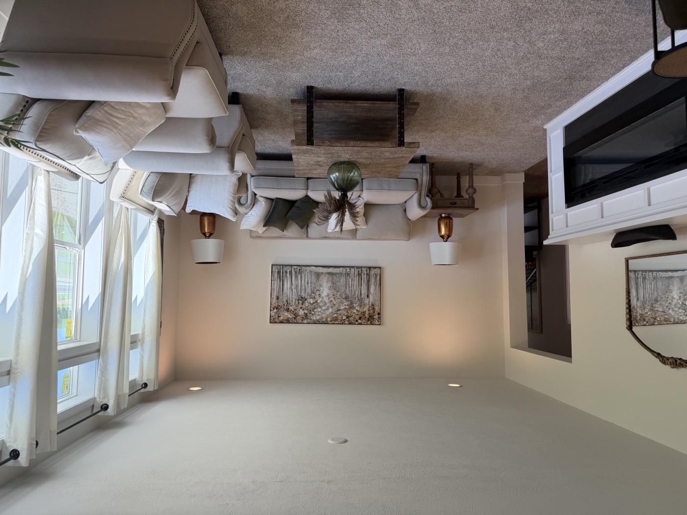 Living room with white fireplace